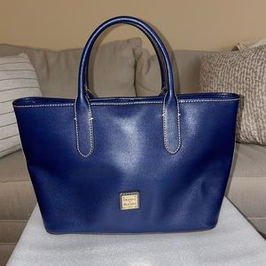 Royal blue top handle Dooney & Bourke bag with shoulder strap.